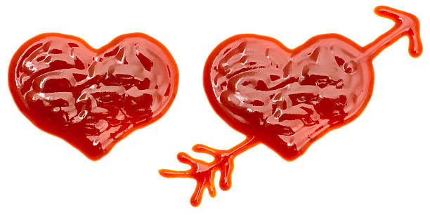 Hearts made of ketchup stock photo