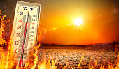istock Heatwave With Warm Thermometer And Fire - Global Warming And Extreme Climate - Environment Disaster 1332108668