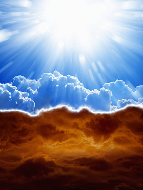 Heaven and hell Religious background - blue sky with bright sun, dark red clouds, heaven and hell evil photos stock pictures, royalty-free photos & images