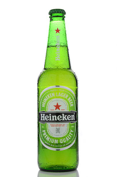 Heineken lager beer isolated on white background stock photo