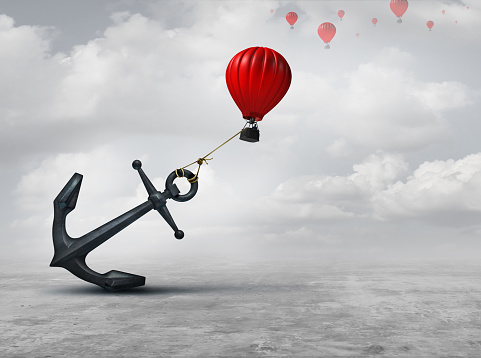 Held back metaphor as a large anchor holding or oppressing an air balloon and restricting movement as a suppression business metaphor  from aspiring to succeed with 3D illustration elements.