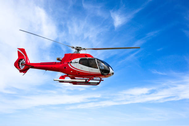 Helicopter A helicopter in flight helicopter stock pictures, royalty-free photos & images