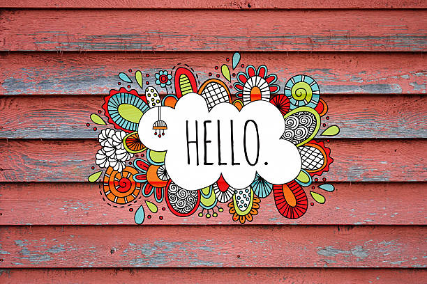 Hello doodle illustration on an old red fence background stock photo