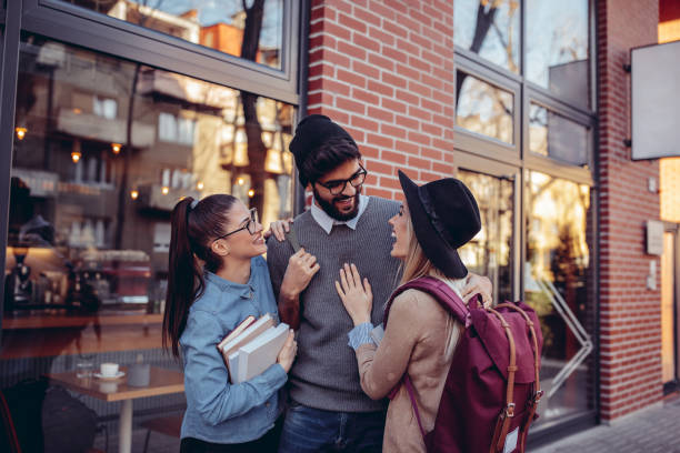 Hello handsome ! Group of students standing outdoors universities in texas stock pictures, royalty-free photos & images