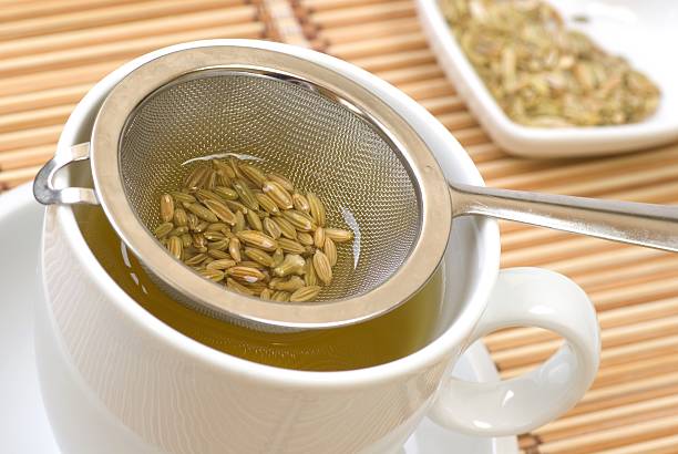 Herbal tea Fennel tee and seeds. fennel stock pictures, royalty-free photos & images