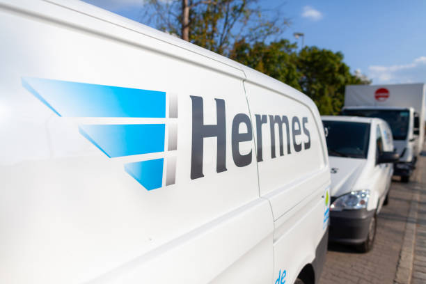 Hermes branch on a Mercedes Benz delivery truck. stock photo
