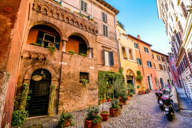 A hidden and medieval alley in the ancient Trastevere district in the heart of Rome stock photo