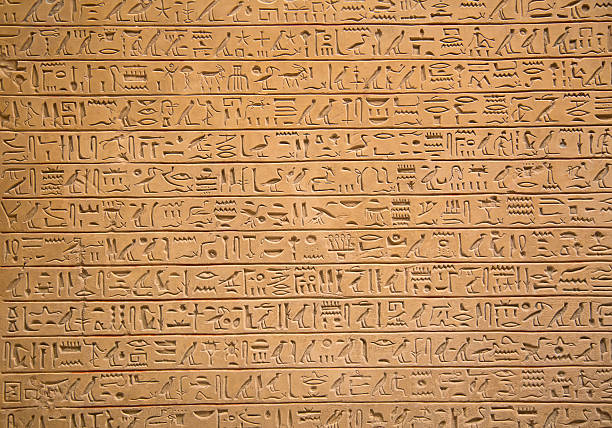 Hieroglyphs on the wall stock photo