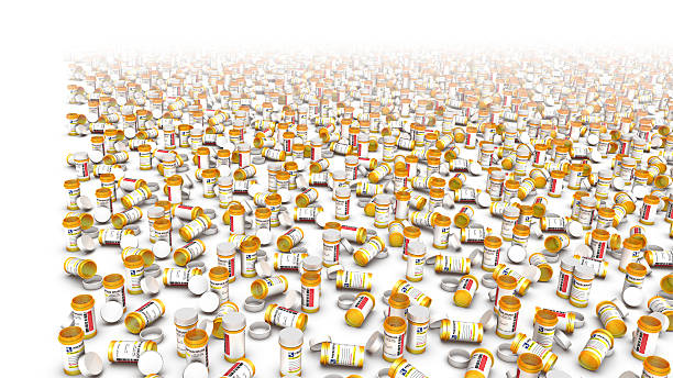 High angle view of empty pill bottles (Left Blank) High angle view of empty pill bottles with a left blank area if you want to add text. xanax pill stock pictures, royalty-free photos & images