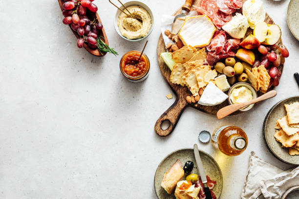 High angle view of fresh Mediterranean tapas platter High angle view of fresh Mediterranean platter. Close-up of food is served on table. It is representing healthy eating. antipasto stock pictures, royalty-free photos & images