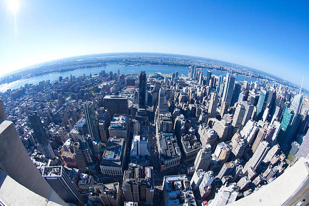 High angle view of New York City High angle view of Manhattan in New York City  from Empire State Building. fish eye lens stock pictures, royalty-free photos & images