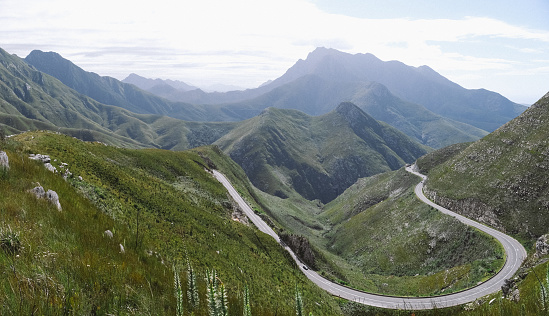 The Outeniqua Pass runs through the majestic mountains near George in the Western Cape. The Outeniqua Pass is a relatively modern pass, connecting the coastal town of George with Oudtshoorn and the Little Karoo