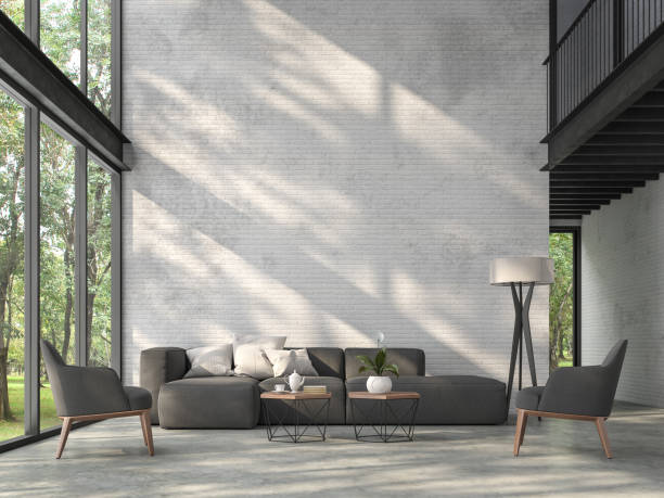 High ceiling loft living room with nature view 3d render High ceiling loft living room 3d render.There are white brick wall,polished concrete floor and black steel structure,There are large windows look out to see the nature,sunlight shining into the room. loft apartment stock pictures, royalty-free photos & images