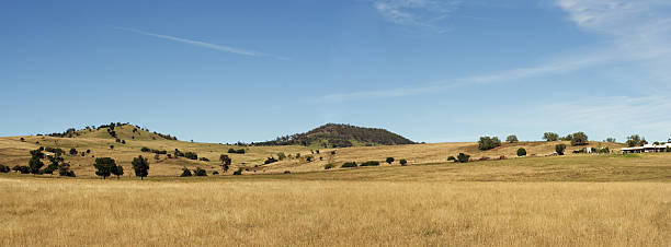 high country farm panorama stock photo