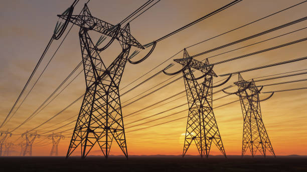 high voltage electric power lines at sunset - elektricitet bildbanksfoton och bilder