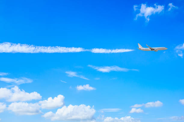 High-altitude airplane and beautiful sky in spring stock photo