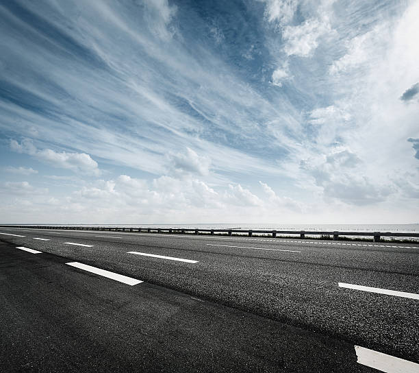 Highway asphalt road dividing line road marking stock pictures, royalty-free photos & images