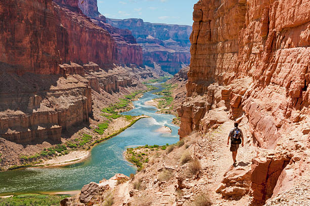 Hike to Puebloean Granaries Scenic hike to Ancestral Puebloean Granaries near mile 52 on the Colorado River. This is one of several images captured during a 200 mile, 16 day trip through the Grand Canyon. grand canyon stock pictures, royalty-free photos & images