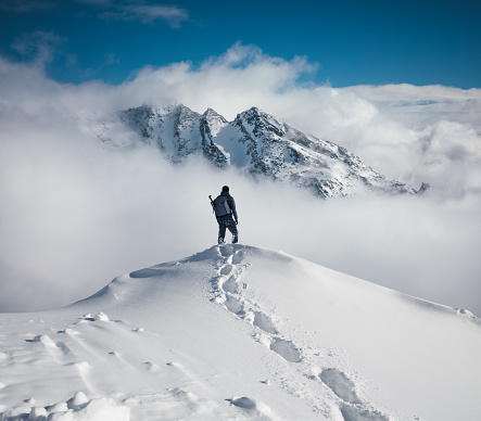 Mountain climbing in pure winter conditions.
