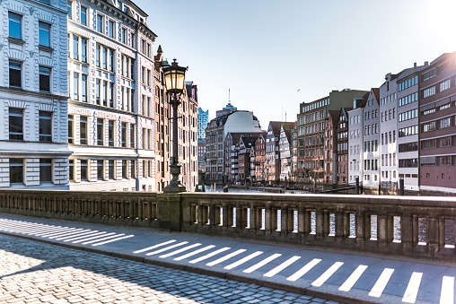 historic buildings on both sides of Nikolaifleet canal in Hamburg