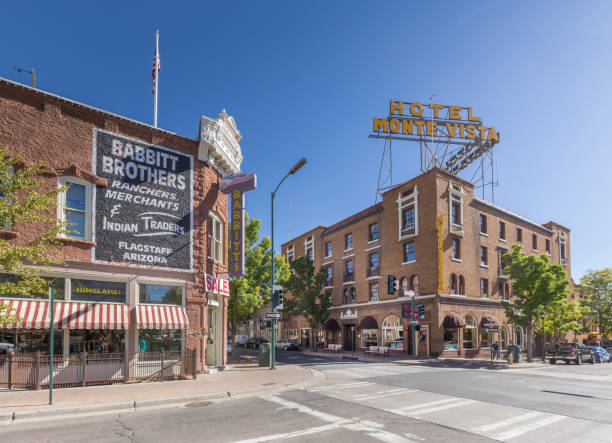 Historic city center of Flagstaff, Arizona, USA Beautiful view of the historic city center of Flagstaff with famous Hotel Monte Vista on sunny day with blue sky in summer, northern Arizona, American Southwest, USA colorado plateau stock pictures, royalty-free photos & images