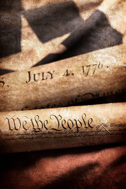 Historic Documents Close up of U.S. Constitution and Declaration of Independence. 1776 american flag stock pictures, royalty-free photos & images