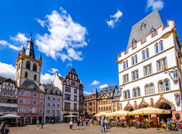 historic old town of Trier in germany Trier, Germany - July 7: historic buildings and tourists at the famous old town of Trier in Germany on July 7, 2020 historic district stock pictures, royalty-free photos & images