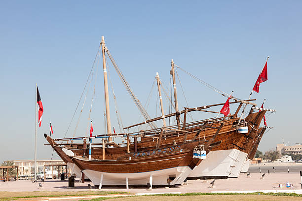 Historic Ships in Kuwait Historic dhow ships at the Maritime Museum of Kuwait. Arabia, Middle East dhow stock pictures, royalty-free photos & images