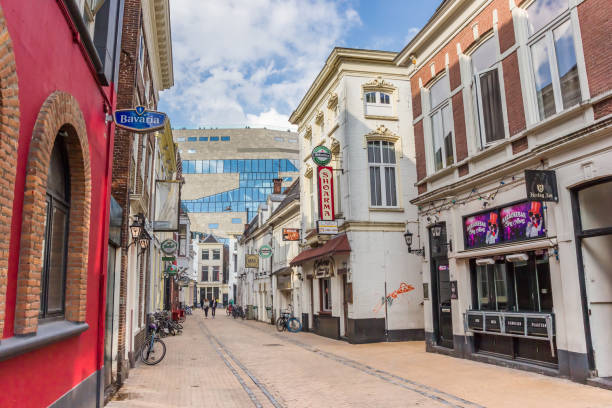 Historic street with bars and pubs leading to the Forum in Groningen Historic street with bars and pubs leading to the Forum in Groningen, Netherlands groningen city stock pictures, royalty-free photos & images