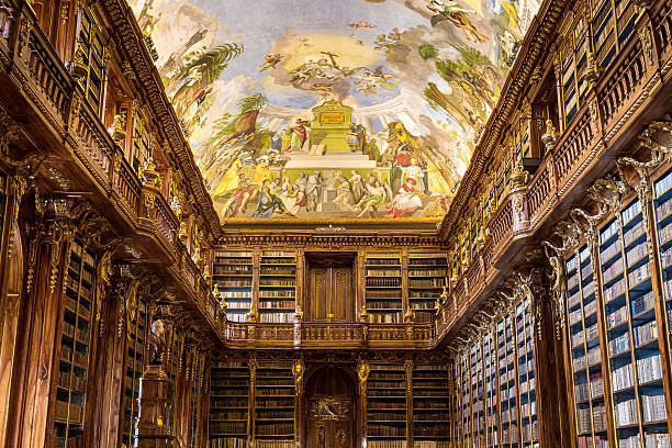 Historical library of Strahov Monastery in Prague, Philosophical Hall Prague, Czech Republic - October 23, 2016: Big Philosophical room of the historic library in the old building of Strahov monastery on October 23, 2016 in Czech Republic. Philosophical Hall was built in 1784 by Jan Ignaz Palliardi prague art stock pictures, royalty-free photos & images