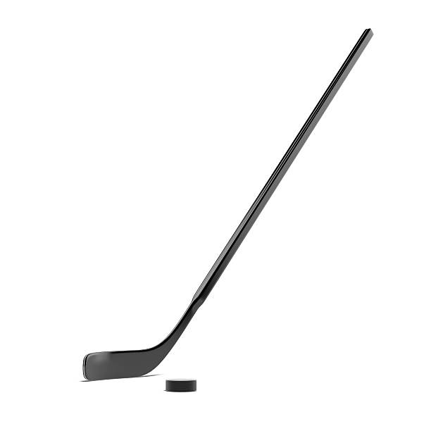 Hockey stick and a puck against a white background Hockey Stick and Puck  isolated on a white background hockey stick stock pictures, royalty-free photos & images