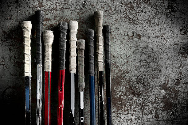 Hockey Sticks Close-up of a bunch of hockey sticks. hockey stick stock pictures, royalty-free photos & images