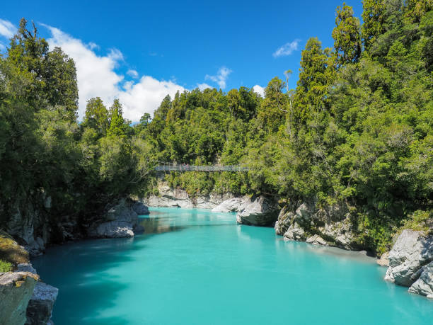 Hokitika Gorge, The vivid turquoise water surrounded by lush native bush. (South Island, NZ) stock photo