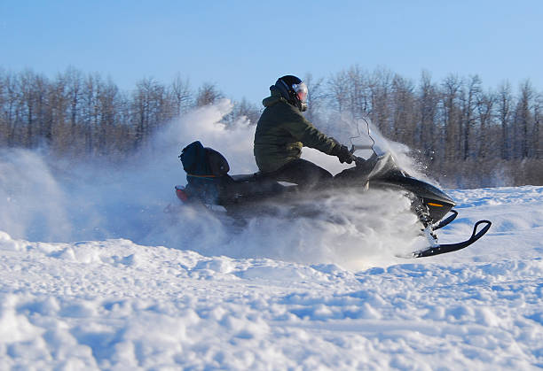 Hold On Snowmobiler! stock photo