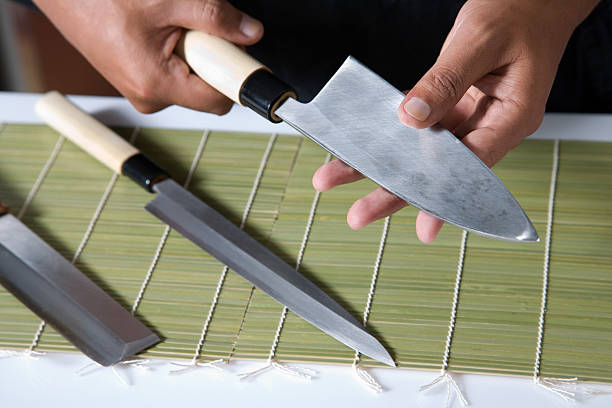 Holding A Sushi Knife stock photo