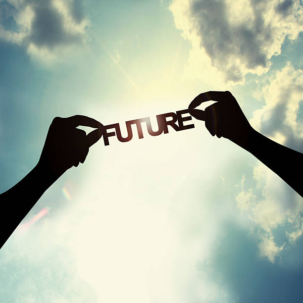 Holding future in sky stock photo