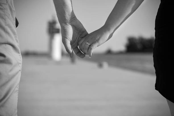 Holding Hands stock photo