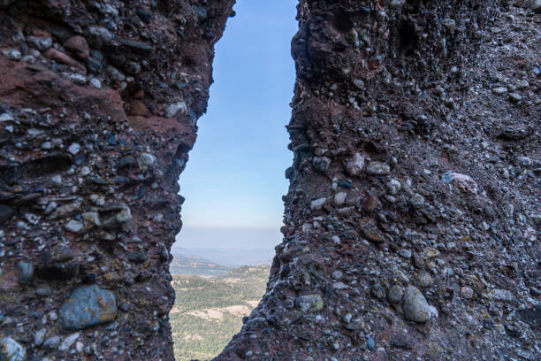 Hole in the rock in natural park of "Sant LlorenÇ de Munt i l´Obac". stock photo