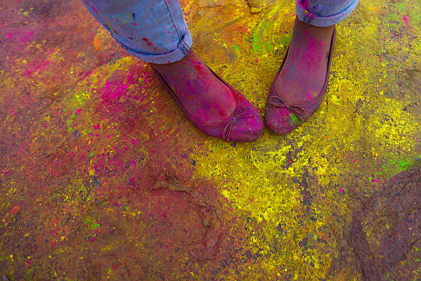 Holi festival foots with coloured powder stock photo