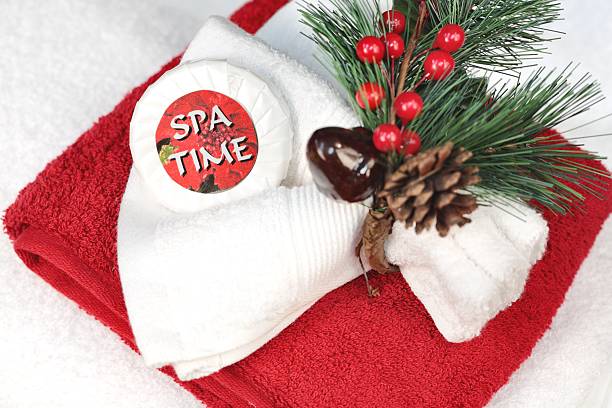 Holiday: Christmas Spa with red and white towels stock photo