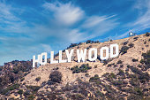istock Hollywood sign in Los Angeles on blue sky 1305790787