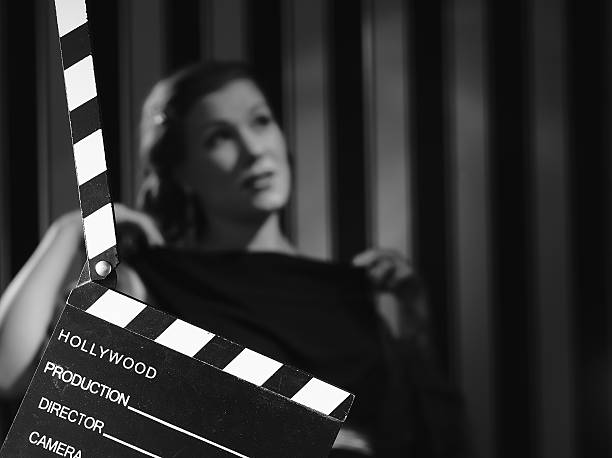 Hollywood woman and clapboard stock photo