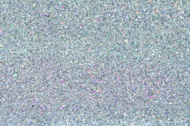 Holographic multicolor chrome texture. Sequins powder. Colored glitter. Shining background stock photo
