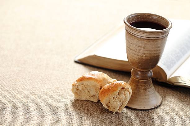 Holy communion Communion still life - wine, bread and Bible chalice photos stock pictures, royalty-free photos & images
