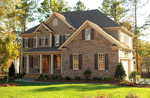 Home Exterior Suburban home in afternoon sunlight brick house stock pictures, royalty-free photos & images