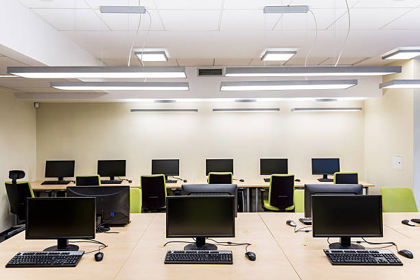 Home for every information technology student Shot of a bright room with several computers computer training stock pictures, royalty-free photos & images