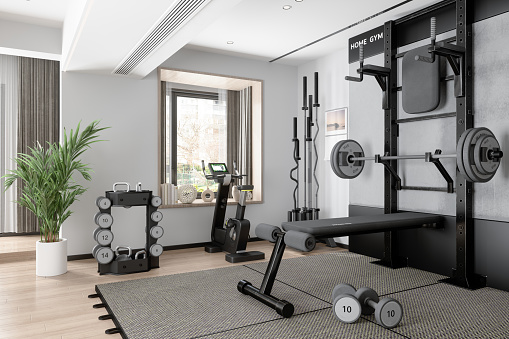 Home Gym With Barbell, Dumbbells, Exercise Bike And Other Sports Equipments