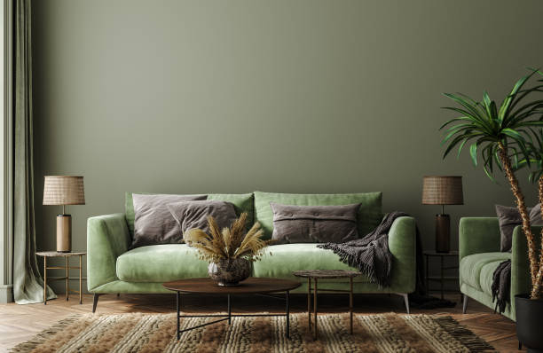 Home interior mock-up with green sofa, table and decor in living room stock photo