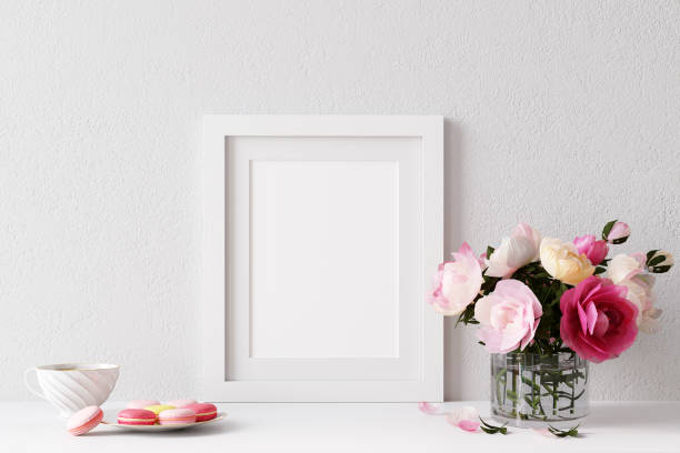 Home interior poster mock up with horizontal white frame on white wall, decorative pink flowers, colorful biscuits. 3D rendering. 3D Illustration stock photo