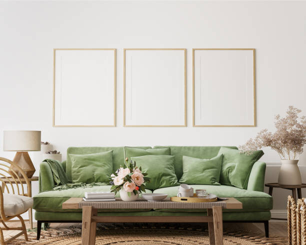 Home interior with poster frame mockup, green comfortable sofa on white wall with wooden furniture 